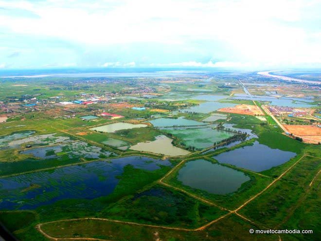 A view of the outskirts of Phnom Penh through the plane window.