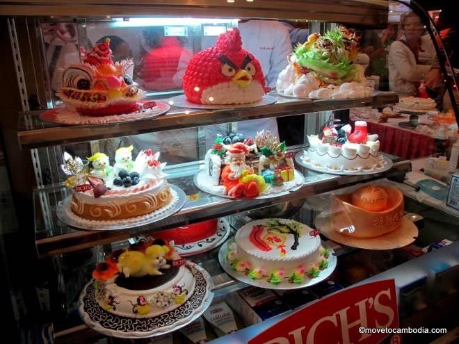 A selection of popular birthday cakes in Cambodia. 